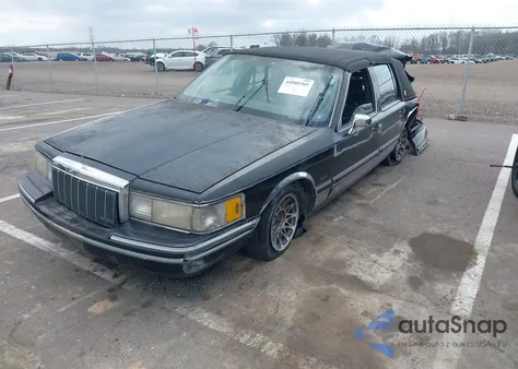 1991 Lincoln Town Car Signature z USA, uszkodzony, nr VIN 1LNCM82W9MY688407